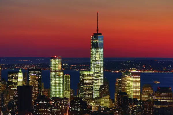 General view of the New York Manhattan city skyline at sunset and One World Trade Center ( 1 WTC ), New York. America
