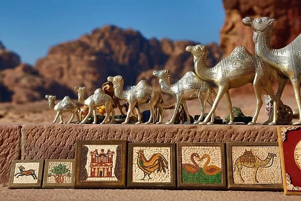 Camel souvenirs on sale at the Urn Tomb of the Royal Tombs in the rock city of Petra