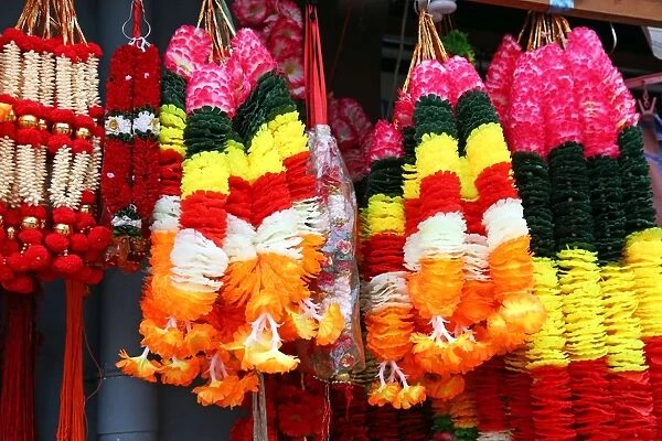 Floral religious garlands hanging in a market in Little India in Singapore, Republic of Singapore