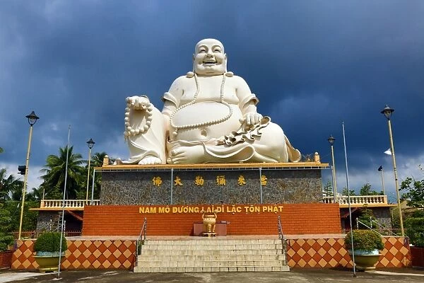 Giant Buddha statue at Vinh Trang Temple, near My Tho, Mekong Delta, Vietnam