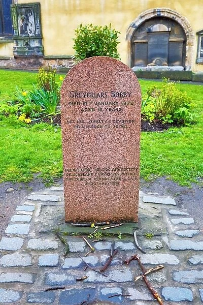 Grave of Greyfriars Bobby the loyal Skye Terrier that stayed by his masters gave