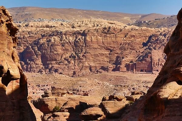 Tombs in sandstone rocks around the valley in the rock city of Petra, Jordan