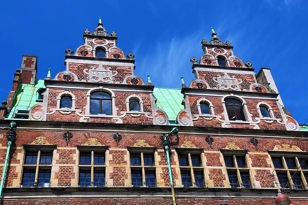 Traditional architecture of the Royal Copenhagen shop building roof in Stroget in Copenhagen