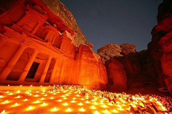 View of the Treasury, Al-Khazneh, at night with candles, Petra, Jordan