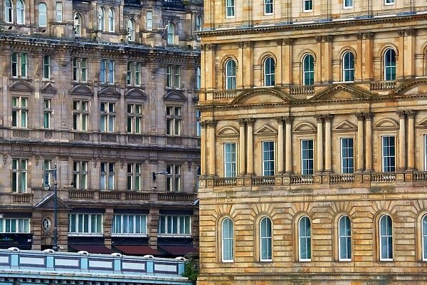 Windows of classic old building on North Bridge in Edinburgh, Scotland, United Kingdom