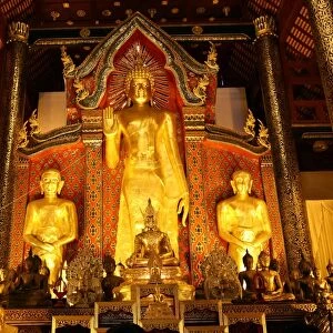 Gold Buddha statue inside the Wat Chedi Luang Temple in Chiang Mai, Thailand
