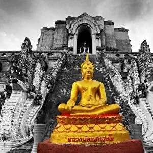 Gold Buddha statue at the Wat Chedi Luang temple, Chiang Mai, Thailand
