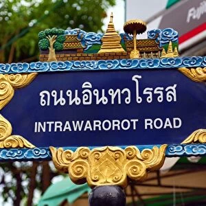 Intrawarorot Road street sign in Chiang Mai, Thailand