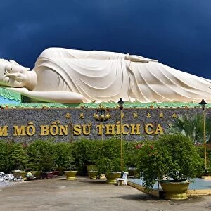 Reclining Buddha statue at Vinh Trang Temple, near My Tho, Mekong Delta, Vietnam