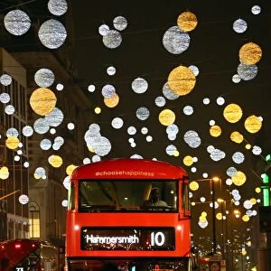 Red bus and Oxford Street Christmas lights in London