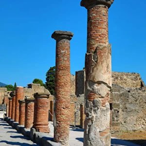 Ruined pillars in the ancient Roman city of Pompeii, Italy