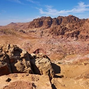 View of sandstone rock formations overlooking the valley of the rock city of Petra