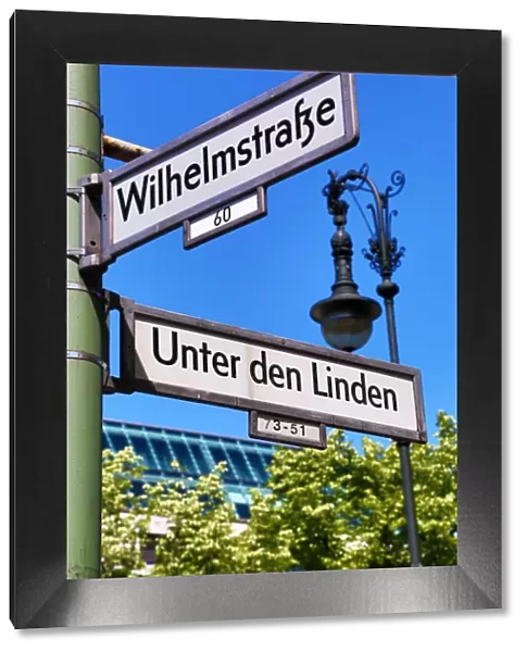 Unter den Linden and Wilhelmstrasse street sign in Berlin, Germany