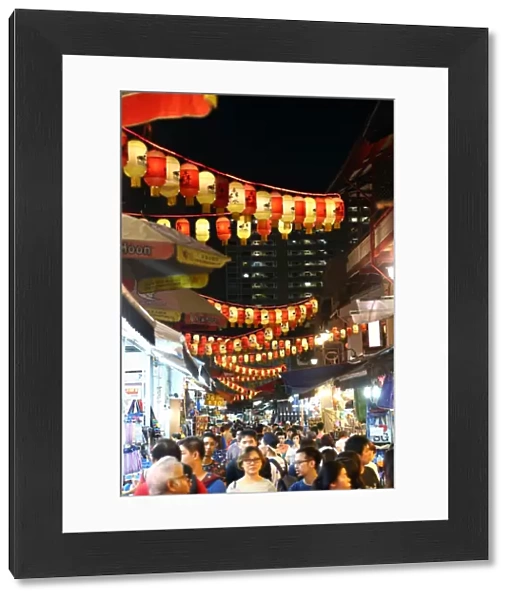 Lanterns above a street market in Chinatown for Autumn Festival in Singapore, Republic of Singapore
