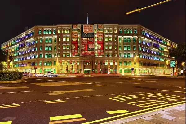 Rainbow coloured lights in the windows of the Old Hill Street Police Station housing the Ministry of Communications and Information in Singapore, Republic of Singapore