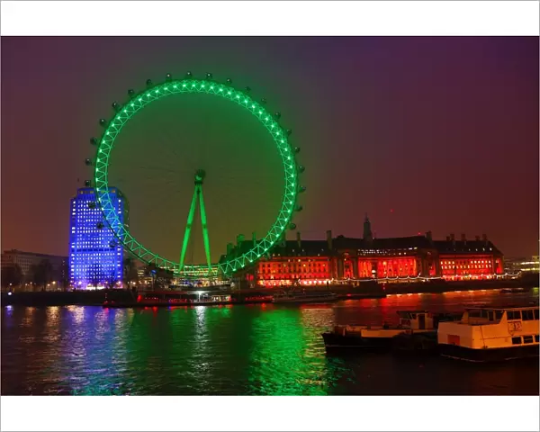 The London Eye goes green to celebrate St. Patricks Day in London, England
