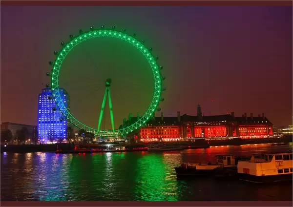 The London Eye goes green to celebrate St. Patricks Day in London, England
