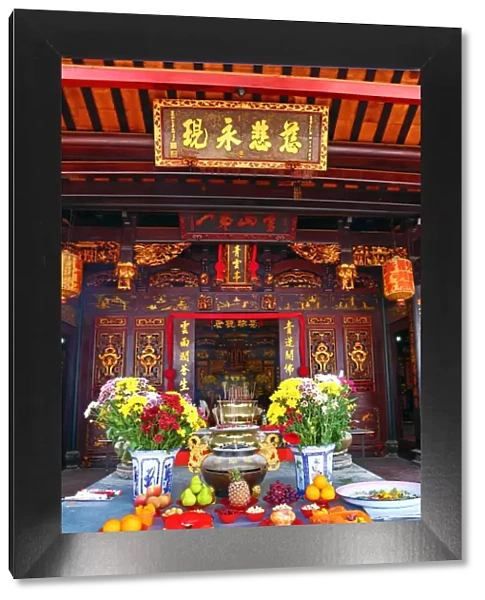 Incense burning on the altar at the Cheng Hoon Teng Chinese Temple in Malacca, Malaysia