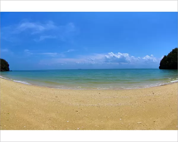 Empty tropical sandy beach in the Kilim Geoforest Park, Langkawi, Malaysia