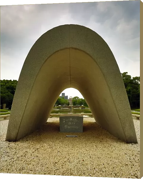 The Memorial Cenotaph and the Genbaku Domu, Atomic Bomb Dome, in the Hiroshima Peace Memorial Park, Hiroshima, Japan