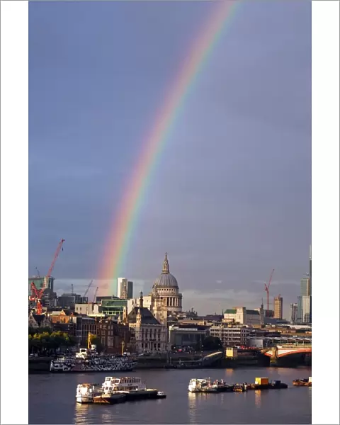 Rainbow over the River Thames and City of London, England