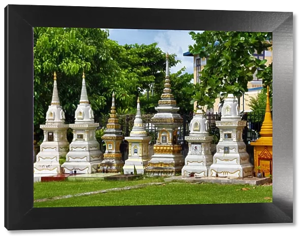 Graves in a cemetery at Wat Si Saket Buddhist Temple, Vientiane, Laos