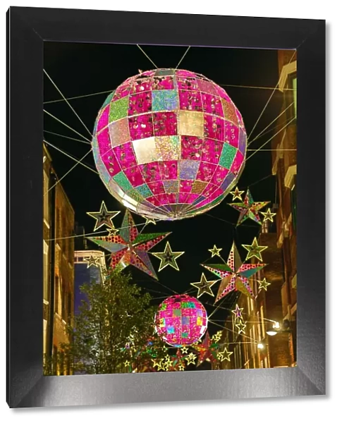 Christmas decorations, balls and stars, Carnaby Street, London