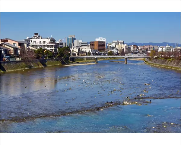 River Kamo and general city view of Kyoto, Japan