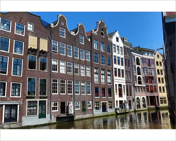Houses on the Oudezijds Kolk canal in Amsterdam, Holland