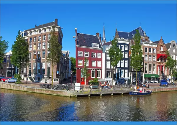 Singel Canal with Traditional Dutch houses in Amsterdam, Holland