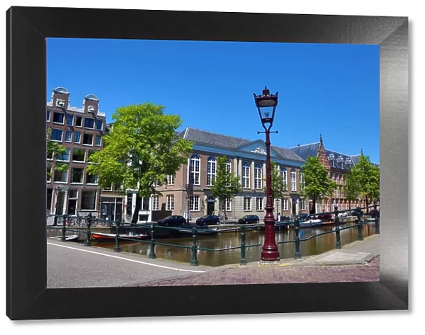 Street scene with lamppost and canal in Amsterdam, Holland
