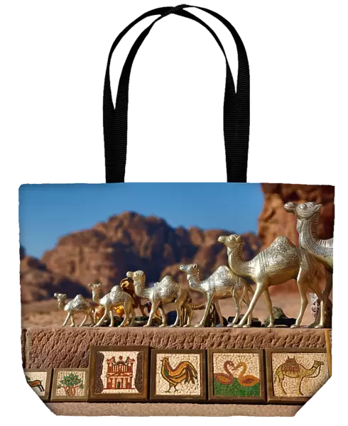 Camel souvenirs on sale at the Urn Tomb of the Royal Tombs in the rock city of Petra