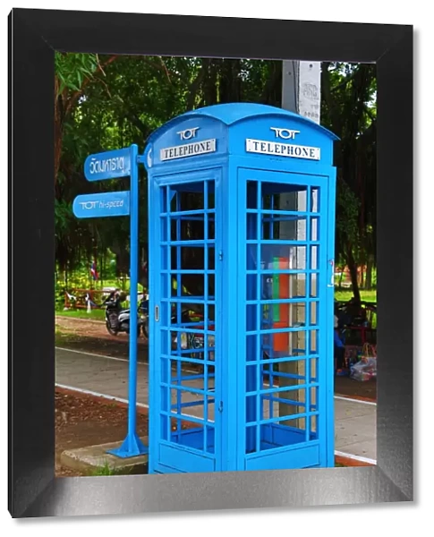Blue traditional London  /  British telephone box in Ayutthaya, Thailand