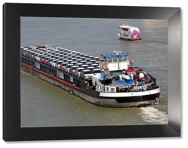 Cargo ship transporting motor cars on the River Danube, Budapest, Hungary