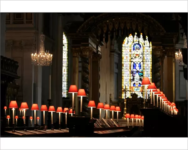 Lamps and stained glass window in St. Pauls Cathedral