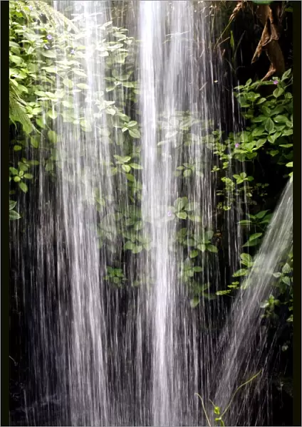 Waterfall. Rushing water falling from waterfall