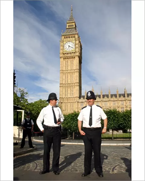 Policemen outside the Houses of Parliament and Big Ben, London