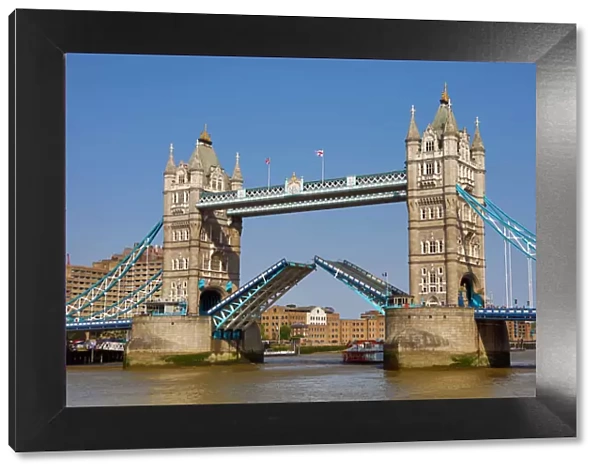 Tower Bridge raised on the River Thames, London