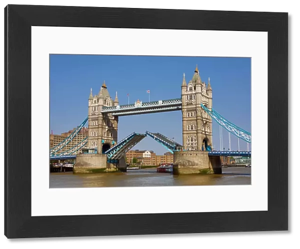 Tower Bridge raised on the River Thames, London