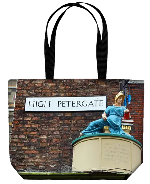 High Petergate street sign and statue in York, Yorkshire, England