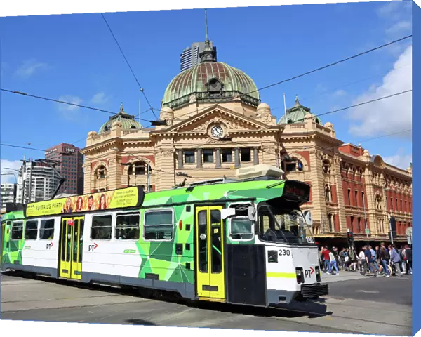 City tram passing Flinders Street Station, Melbourne, Victoria, Australia