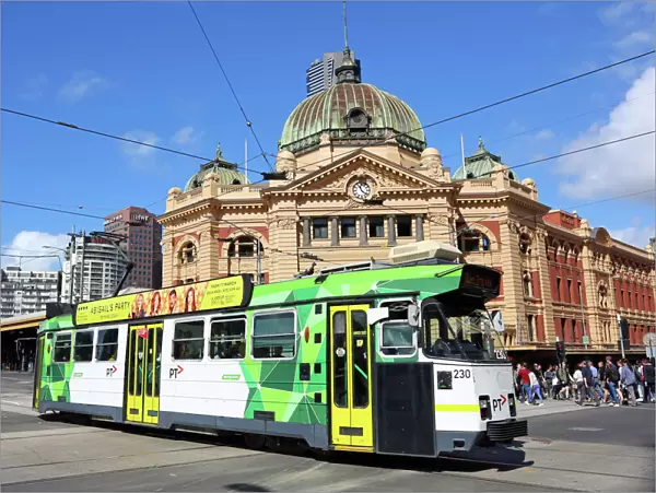 City tram passing Flinders Street Station, Melbourne, Victoria, Australia