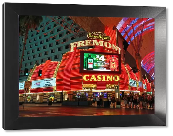 Neon lights of casinos in Fremont Street at night, Las Vegas, Nevada, America