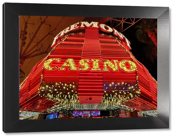 Neon lights of casinos in Fremont Street at night, Las Vegas, Nevada, America