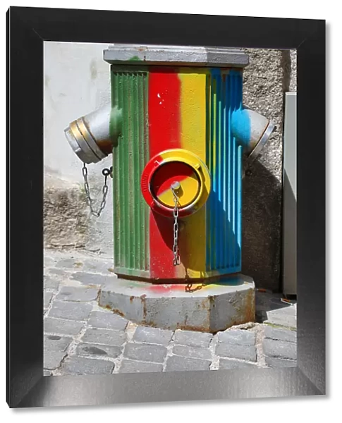 Multi-coloured fire hydrant in Porto, Portugal