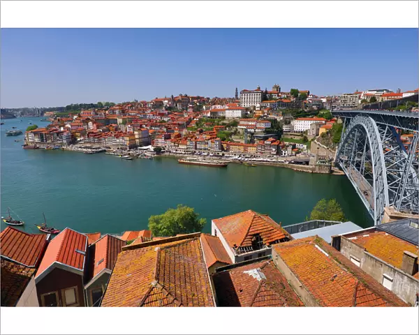 The Dom Luis I metal arch bridge and the city skyline in Porto, Portugal