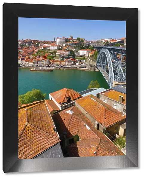 The Dom Luis I metal arch bridge and the city skyline in Porto, Portugal