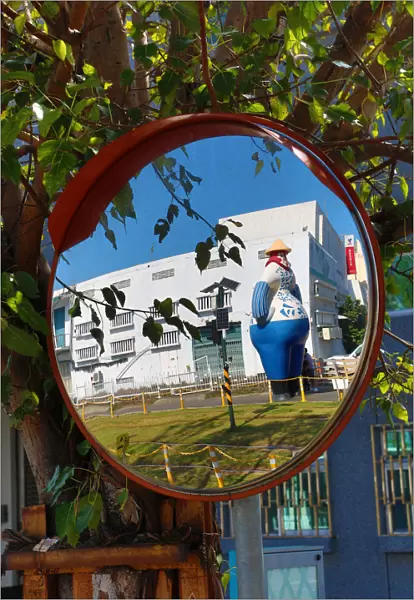 Statue at the Pier 2 Art Center in a mirror, Kaohsiung City, Taiwan