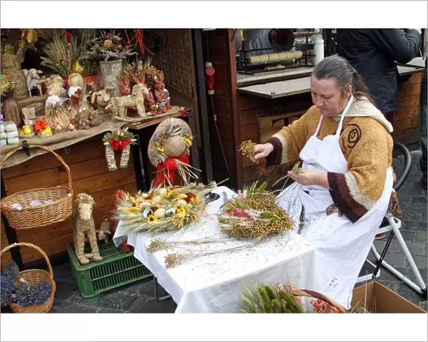 Woman making handicrafts in Prague