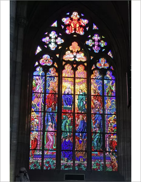 Stained glass window in St. Vitus Cathedral in Prague